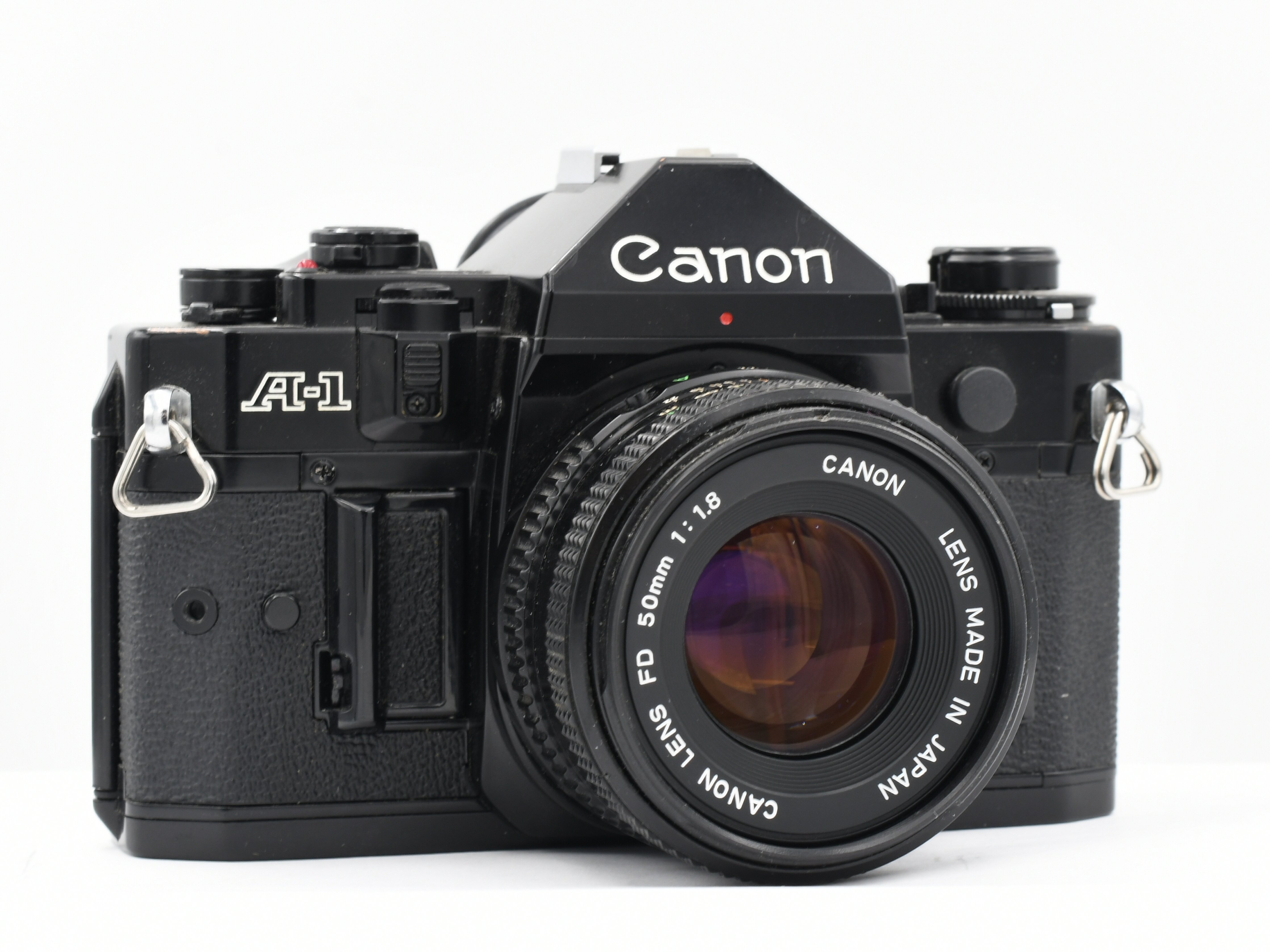 Canon A-1 body with Canon 50mm f1.8 lens - The Photo Center